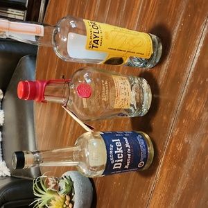 3 Empty Whiskey Bottles